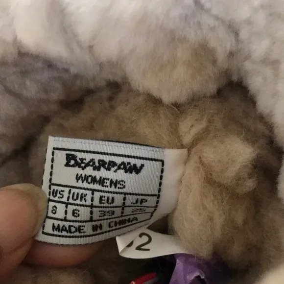 BEARPAW Size 8 fur lined boots with tie.