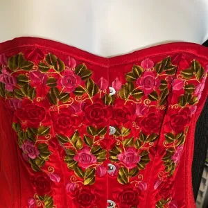Corset hand appliqué roses on rich romantic red velvet.