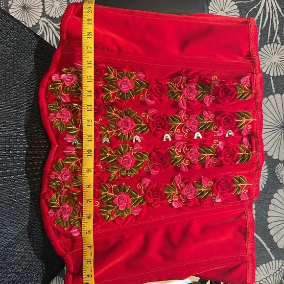 Corset hand appliqué roses on rich romantic red velvet.