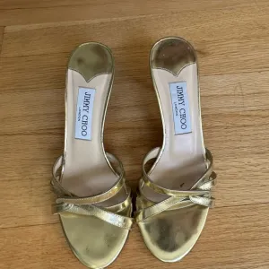 Jimmy Choo Gold Heels with Elegant Straps