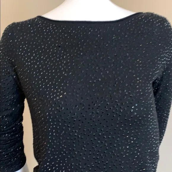 Long sleeve boat neck fully beaded lightweight top