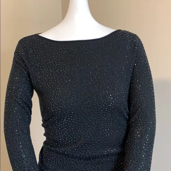 Long sleeve boat neck fully beaded lightweight top