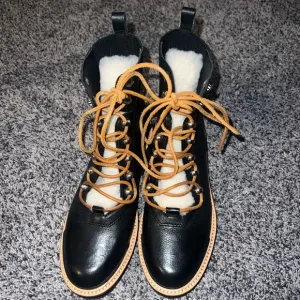 Marc Fisher Izzie genuine shearling lace up boots