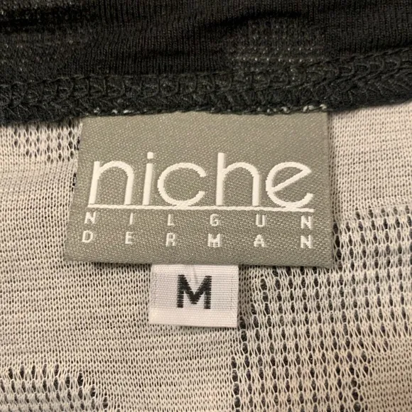 NICHE BY NILGUN DERMAN BLACK “COZY DOT KNIT” BLACK BUBBLE HEM DRESS
