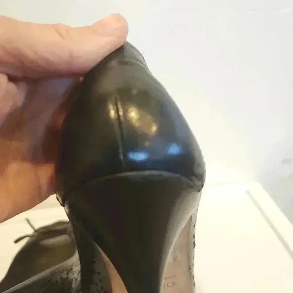 Oscar De La Renta black cutout heels with bow