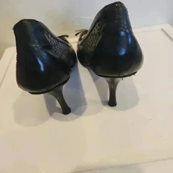 Oscar De La Renta black cutout heels with bow