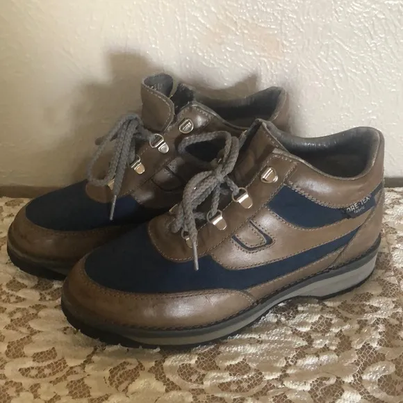 Rugged Brown and Black Hiking Boots with Sturdy Sole