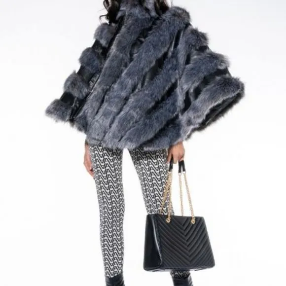 RUNWAY SUPERMODEL STATUS  MOTO PONCHO WITH FAUX FUR ( BRAND NEW !!!)