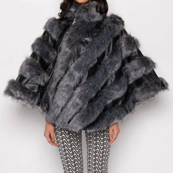 RUNWAY SUPERMODEL STATUS  MOTO PONCHO WITH FAUX FUR ( BRAND NEW !!!)