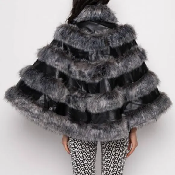RUNWAY SUPERMODEL STATUS  MOTO PONCHO WITH FAUX FUR ( BRAND NEW !!!)