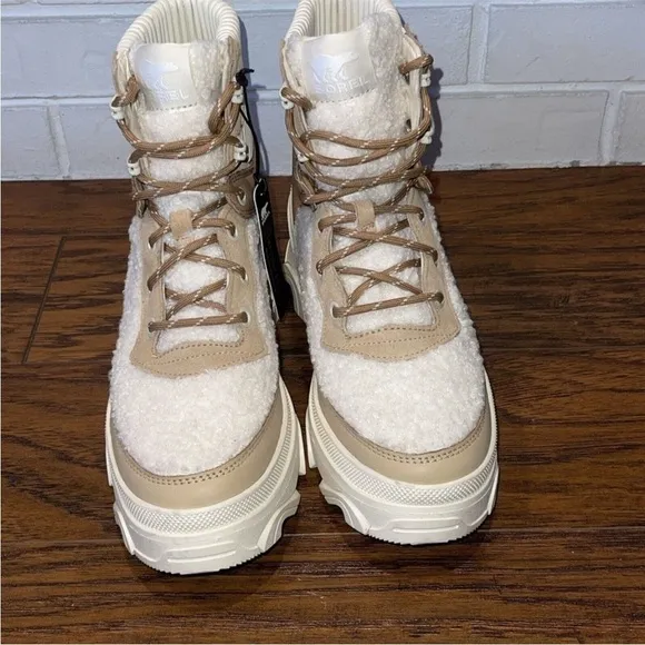 Sorel Tan and Cream Winter Boots with High-Top Design and Chunky Sole