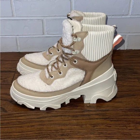 Sorel Tan and Cream Winter Boots with High-Top Design and Chunky Sole