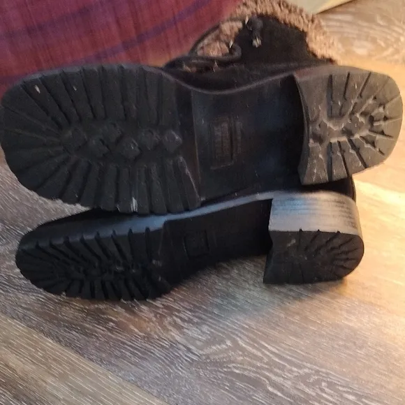 Stuart Weitzman Black and Brown Winter Boots with Cozy Lining and Sturdy Sole