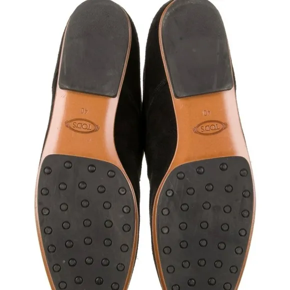Tod’s beautiful black suede lace up short boots.