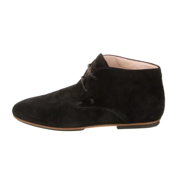 Tod’s beautiful black suede lace up short boots.