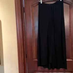 Vince Camuto long skirt with pleat detail at waist and shirt skirt under…