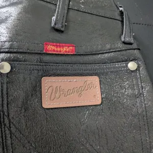 Vintage Wrangler 14MWZYB Faux-Leather Jeans.