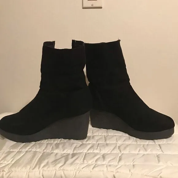 Worn only once Rouche boots